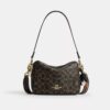 Carey Crossbody Bag in Loved Signature Canvas with Charms