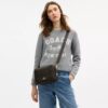 Carey Crossbody Bag in Loved Signature Canvas with Charms