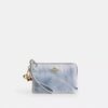 Corner Zip Wristlet in Loved Denim with Charms