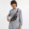 Disney X Coach Charter Belt Bag 7 with Sticker Print