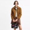 Disney X Coach Rogue Bag 25 with Pluto