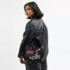 Disney X Coach Rogue Bag 25 with Pluto