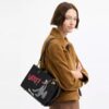 Disney X Coach Rogue Bag 25 with Pluto