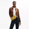Disney X Coach Swinger Bag in Regenerative Leather with Mickey Mouse and Friends