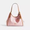 Erin Shoulder Bag in Signature Canvas with Charms