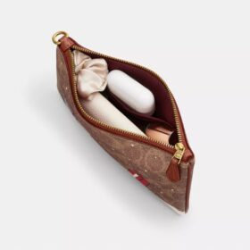 Essential Small Wristlet in Signature Canvas with Holiday Gifts