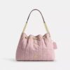 Evelyn Shoulder Bag in Loved Denim with Quilting and Charm