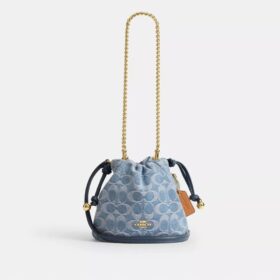 Faye Mini Drawstring Bag in Signature Denim