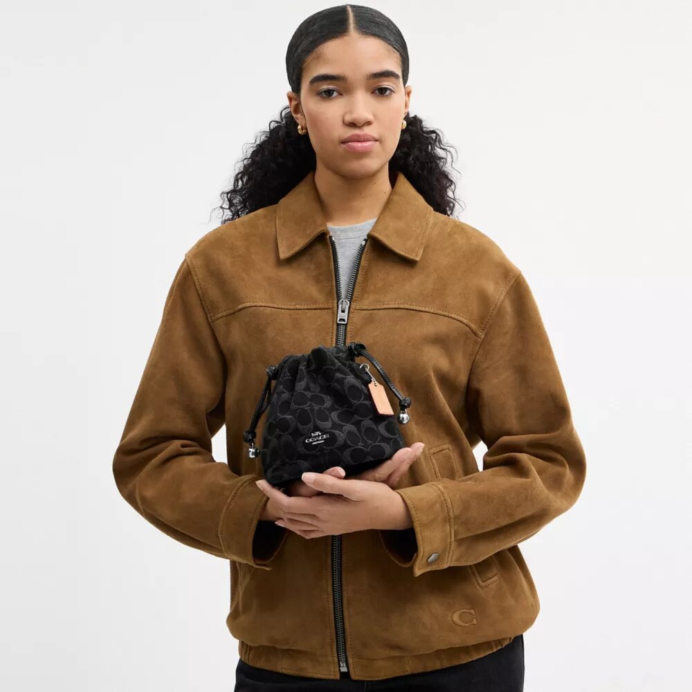 Faye Mini Drawstring Bag in Signature Denim