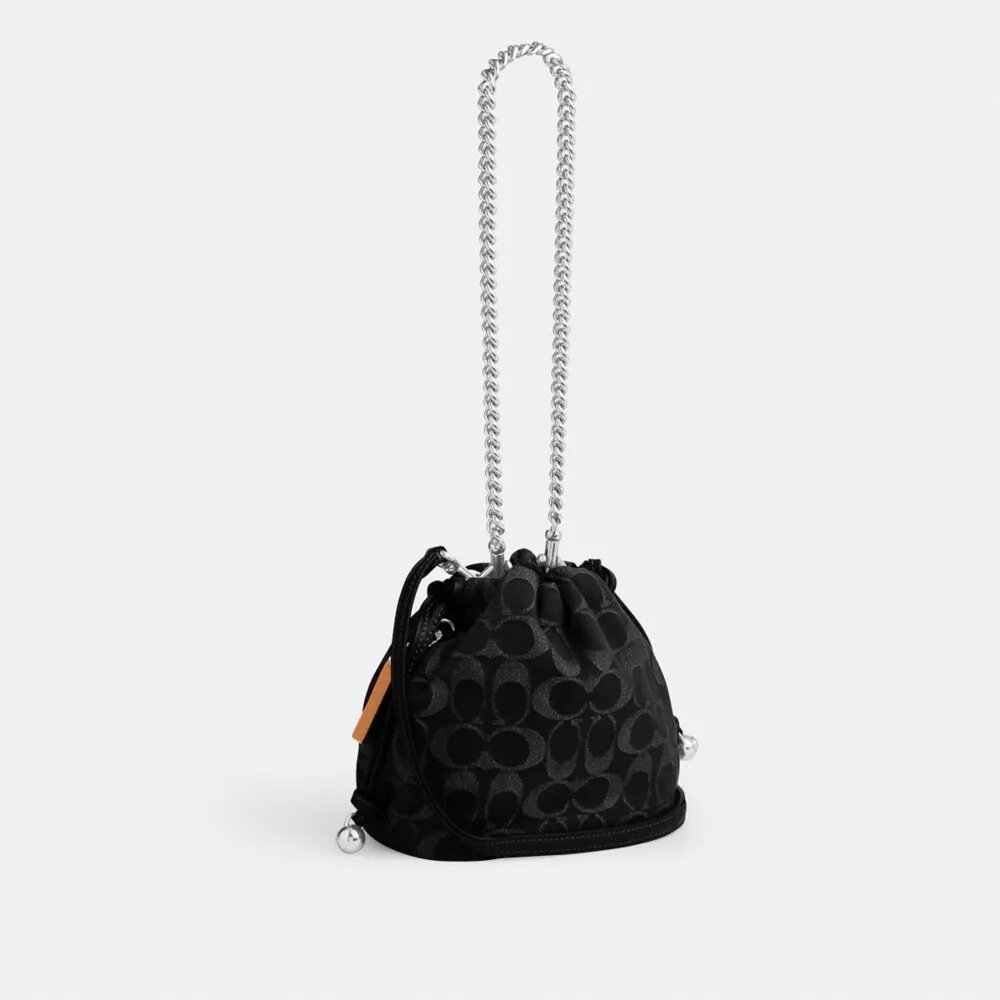 Faye Mini Drawstring Bag in Signature Denim