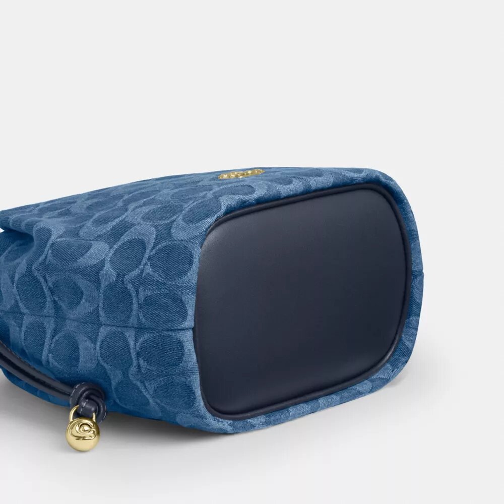 Faye Mini Drawstring Bag in Signature Denim