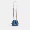 Faye Mini Drawstring Bag in Signature Denim