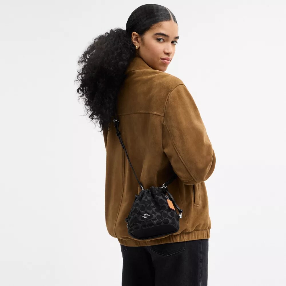 Faye Mini Drawstring Bag in Signature Denim