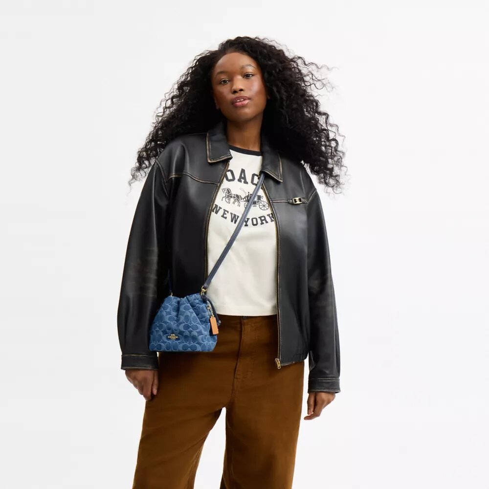 Faye Mini Drawstring Bag in Signature Denim
