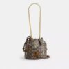Faye Mini Drawstring Bag in Signature Jacquard with Floral Embroidery