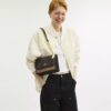 Klare Crossbody Bag in Blocked Signature Canvas