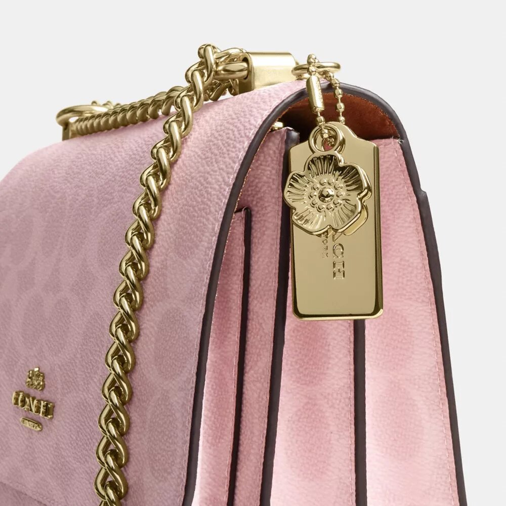 Klare Crossbody Bag in Signature Canvas with Charms