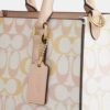 Maggie Small Tote Bag in Signature Canvas