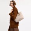 Medium City Tote Bag in Signature Canvas