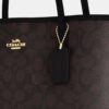 Medium City Tote Bag in Signature Canvas