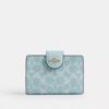 Medium Corner Zip Wallet in Signature Canvas