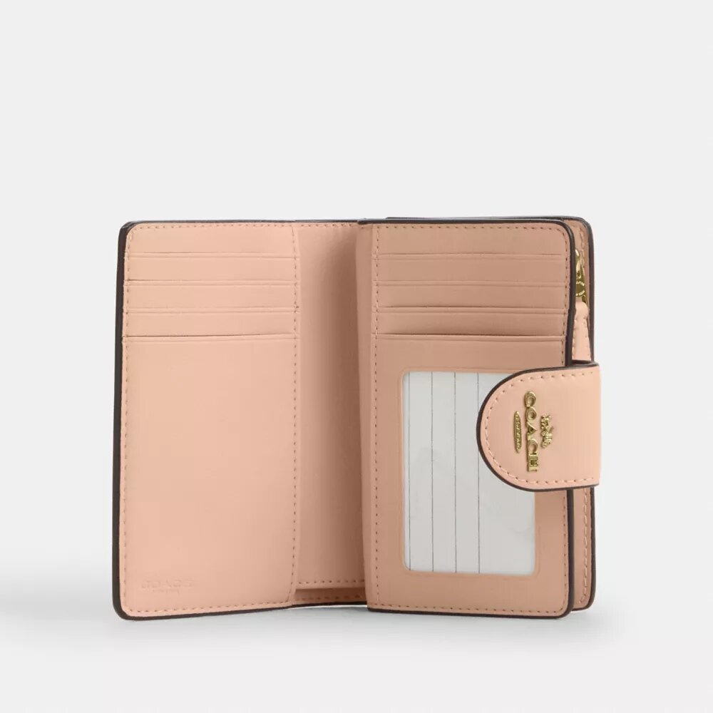 Medium Corner Zip Wallet in Signature Canvas