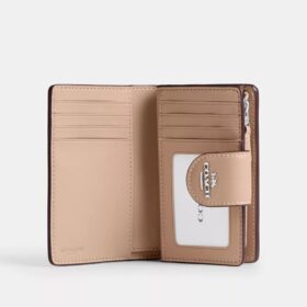 Medium Corner Zip Wallet in Signature Canvas