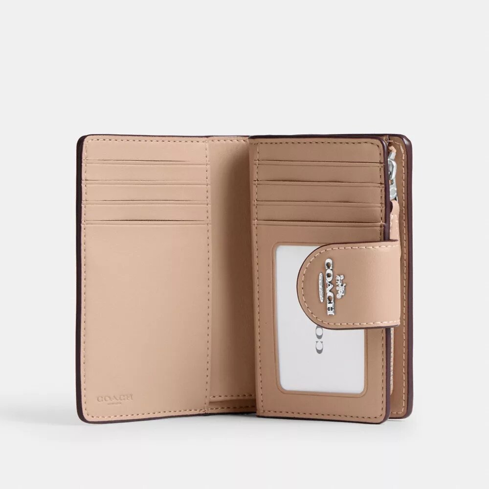 Medium Corner Zip Wallet in Signature Canvas