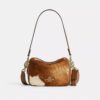 Mini Carey Crossbody Bag in Haircalf with Cow Print