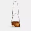 Mini Carey Crossbody Bag in Haircalf with Cow Print