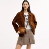 Mini Carey Crossbody Bag in Haircalf with Cow Print