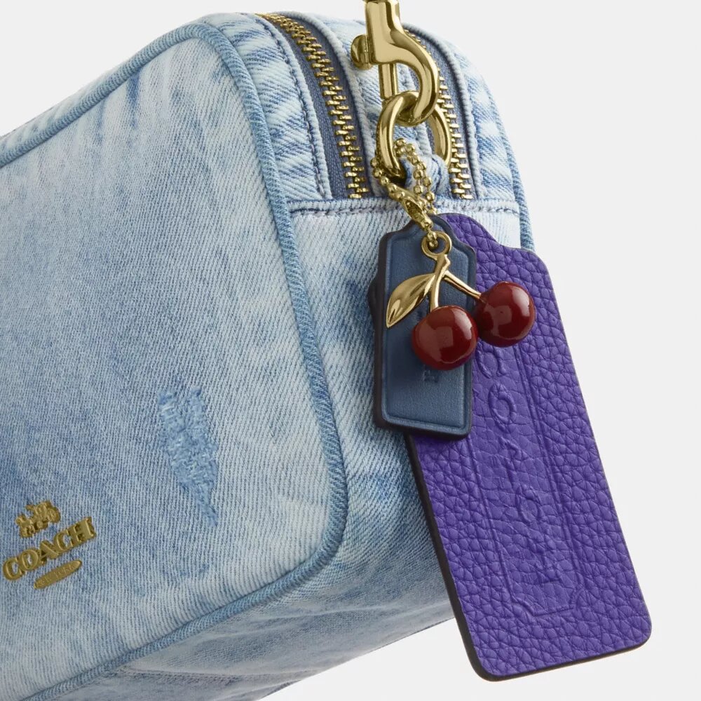 Mini Carey Crossbody Bag in Loved Denim with Charms