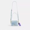 Mini Carey Crossbody Bag in Loved Denim with Charms