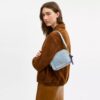 Mini Carey Crossbody Bag in Loved Denim with Charms