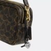 Mini Carey Crossbody Bag in Loved Signature Canvas
