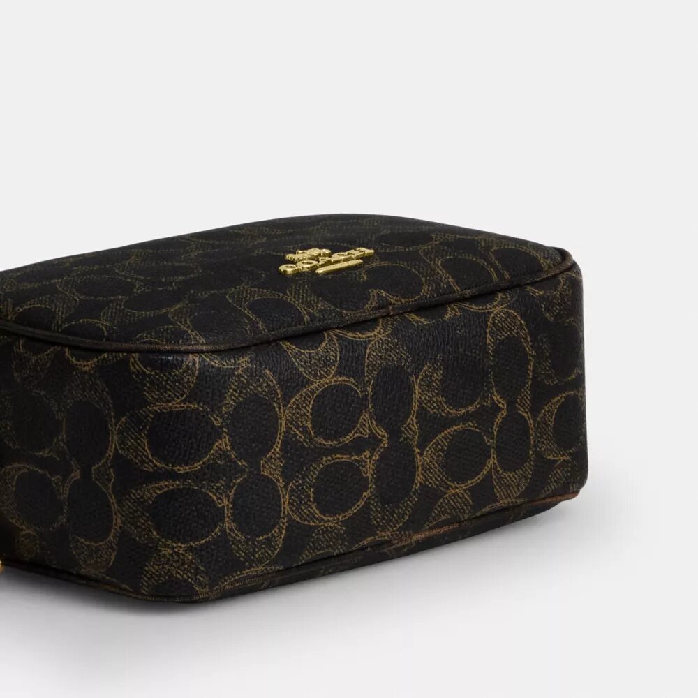Mini Carey Crossbody Bag in Loved Signature Canvas
