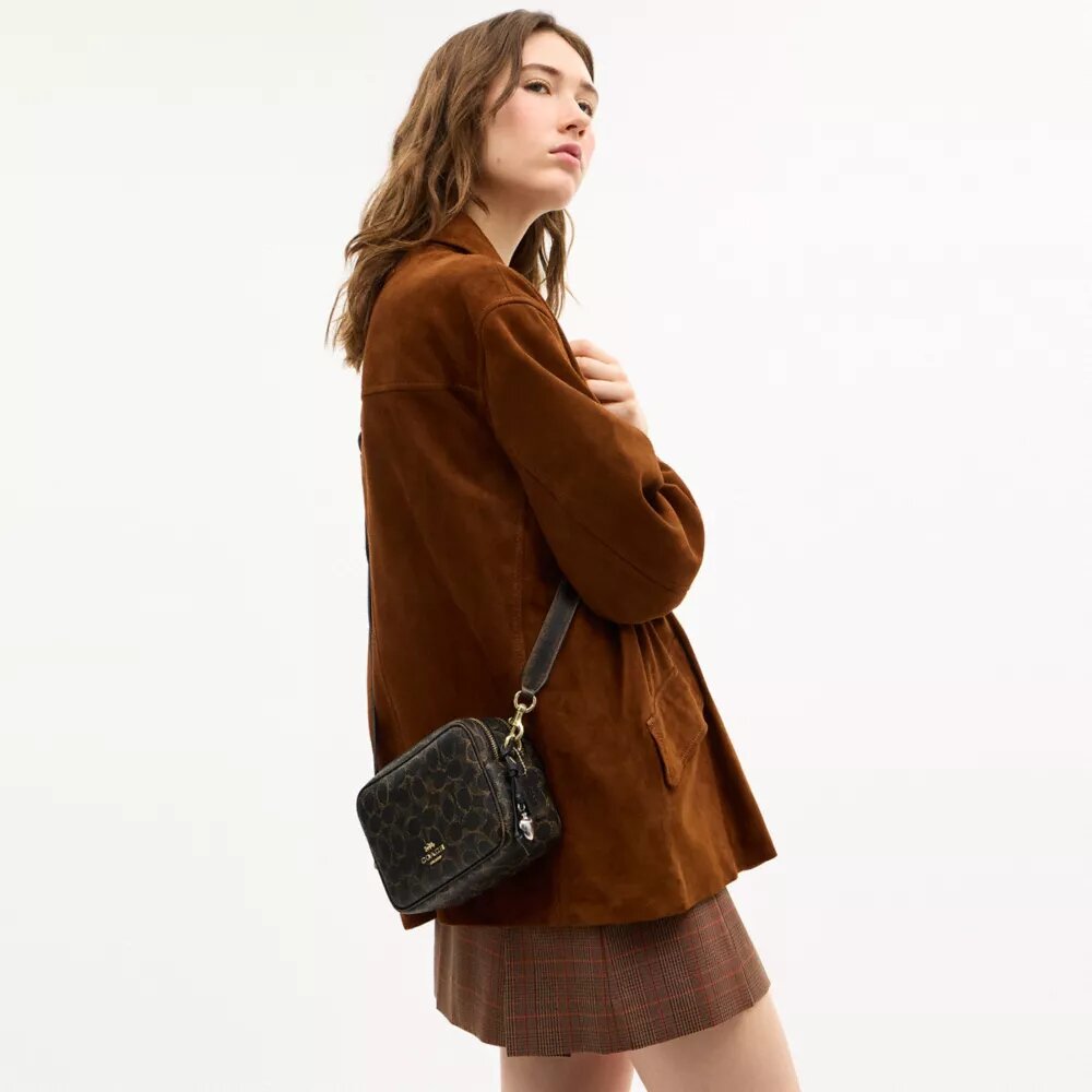 Mini Carey Crossbody Bag in Loved Signature Canvas