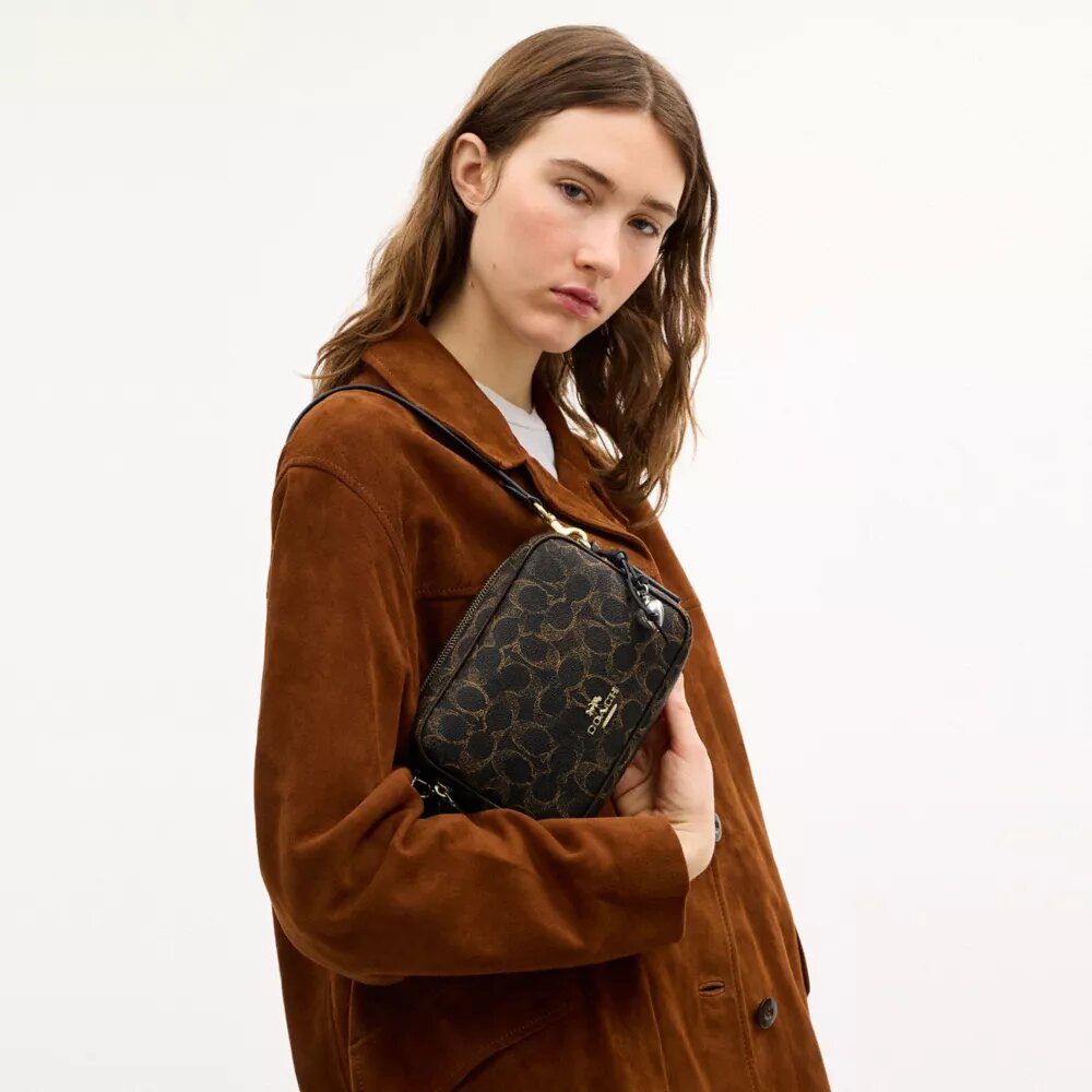 Mini Carey Crossbody Bag in Loved Signature Canvas