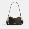 Mini Carey Crossbody Bag in Signature Canvas