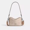 Mini Carey Crossbody Bag in Signature Canvas