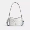 Mini Carey Crossbody Bag in Signature Canvas