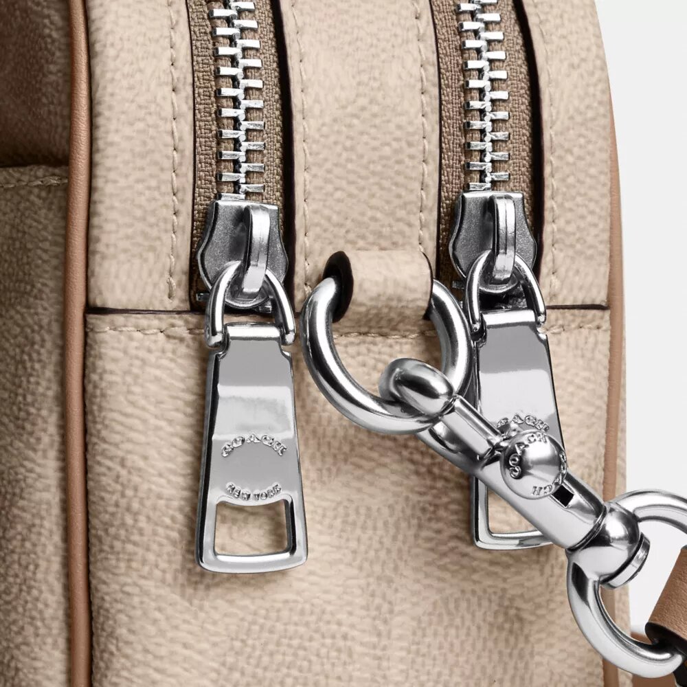 Mini Carey Crossbody Bag in Signature Canvas
