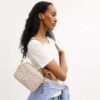 Mini Carey Crossbody Bag in Signature Canvas