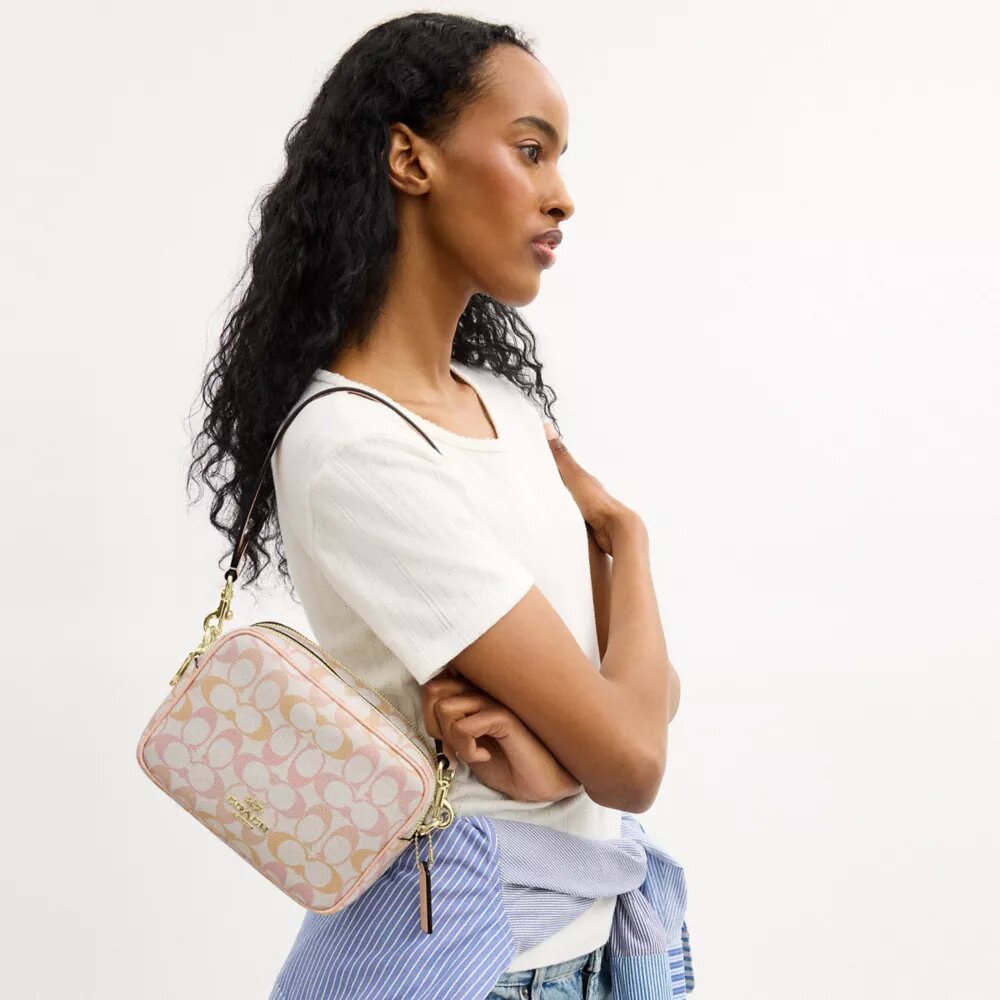 Mini Carey Crossbody Bag in Signature Canvas