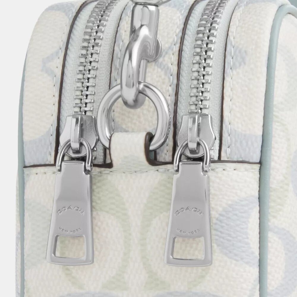 Mini Carey Crossbody Bag in Signature Canvas