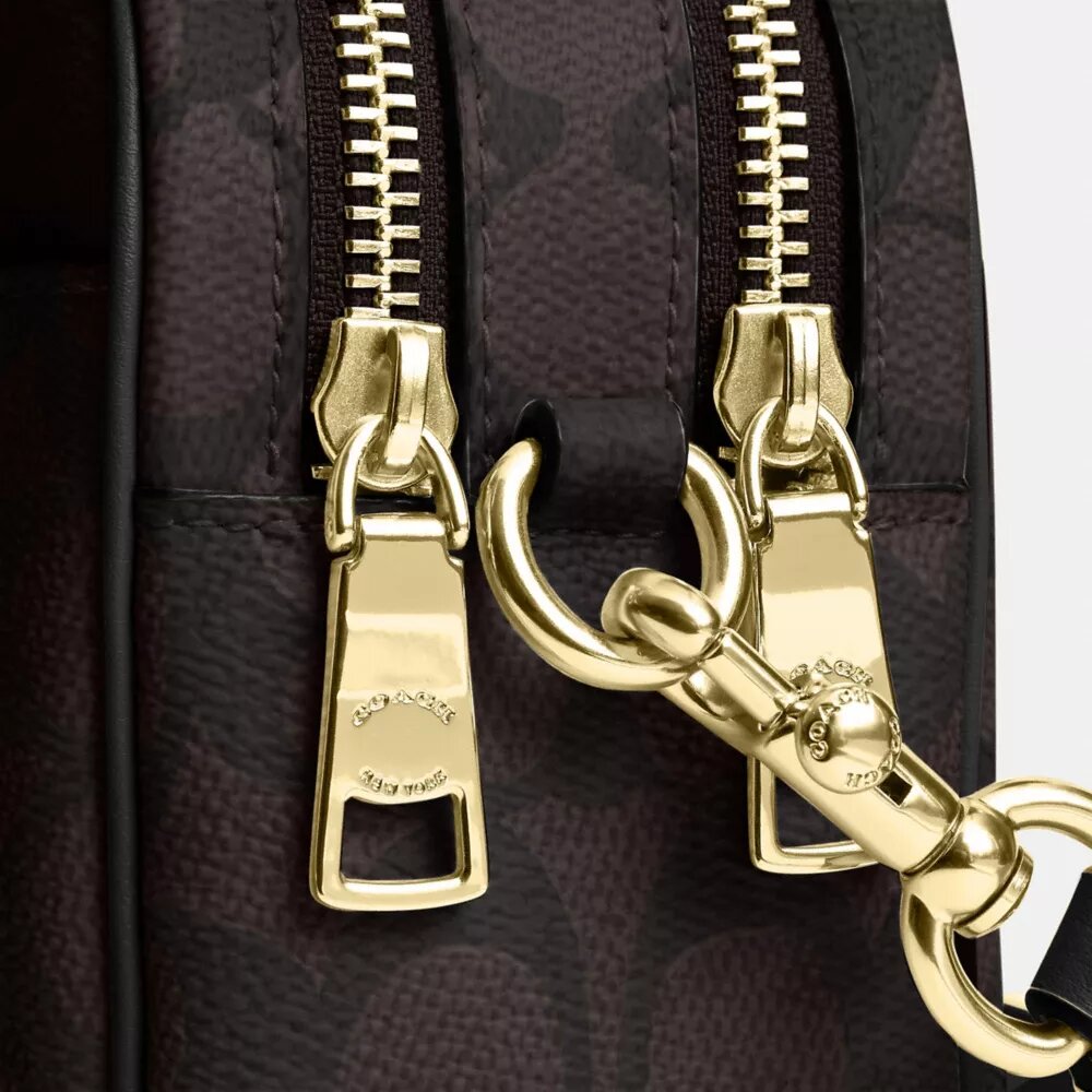 Mini Carey Crossbody Bag in Signature Canvas