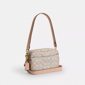 Mini Carey Crossbody Bag in Signature Canvas