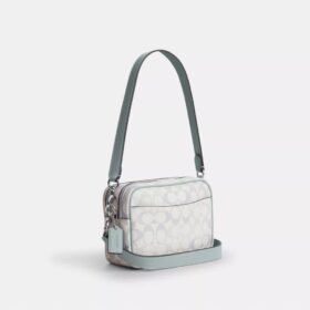 Mini Carey Crossbody Bag in Signature Canvas