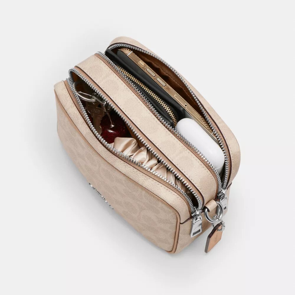 Mini Carey Crossbody Bag in Signature Canvas