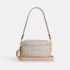 Mini Carey Crossbody Bag in Signature Canvas